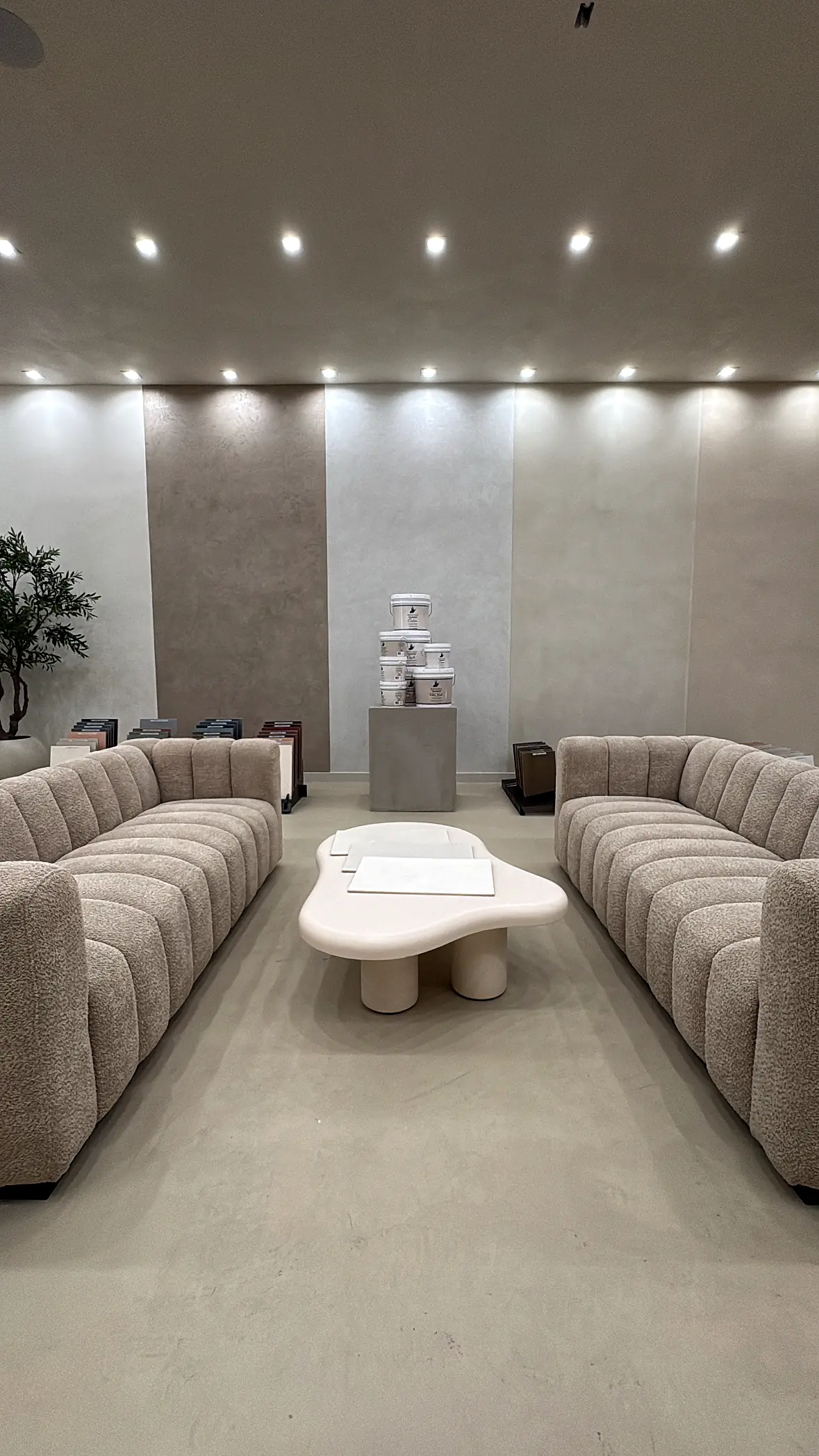 Custom color plaster walls in a lounge with recessed lighting in a Los Angeles home