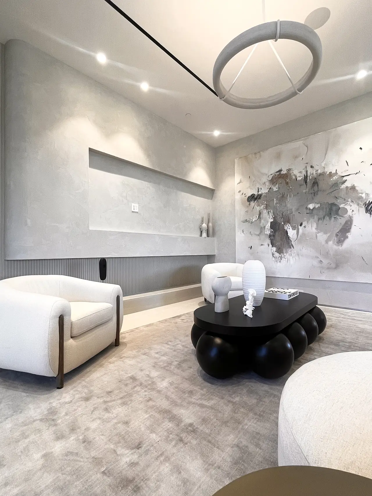 Smooth plaster media wall in a Los Angeles living room
